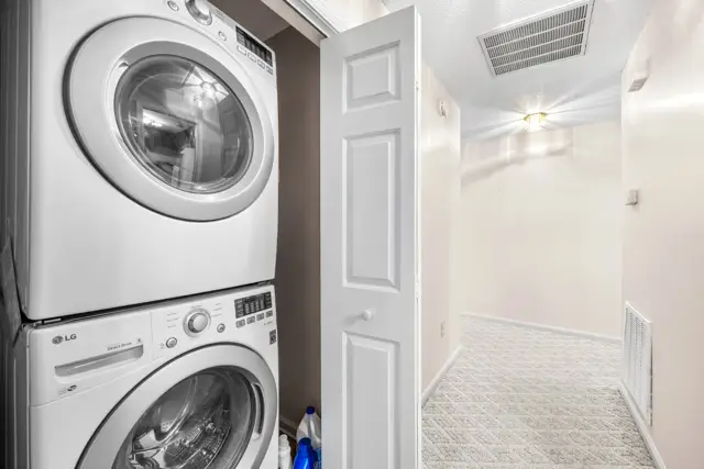 Laundry closet with LG washer and dryer